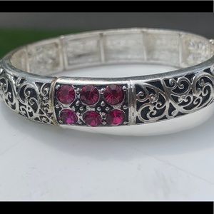 Silver tone with pink crystals stretch bracelet